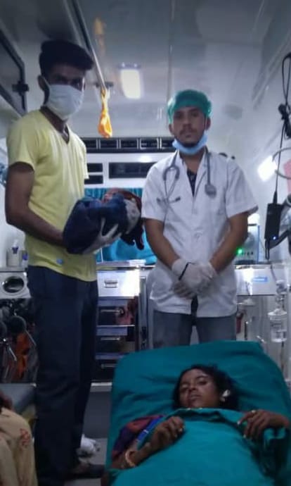 women deliver a baby boy in ambulance